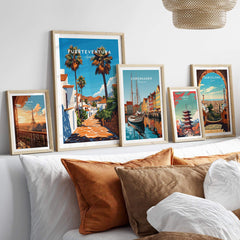 Fuerteventura Print Canary Islands Spain displayed among other travel art prints on a stylish bed.