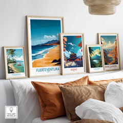 Fuerteventura Travel Poster displayed among various travel posters and framed art on a stylish shelf.