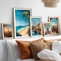 Fuerteventura Wall Art featuring vibrant travel posters and coastal scenery displayed in stylish frames.