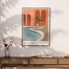Galerie Bohène Poolside Morocco Architecture Poster Minimalist Wall Art Print displayed on a wall above a wooden table.