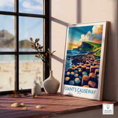 Giant's Causeway Travel Poster displayed on a windowsill, showcasing the stunning natural beauty of Northern Ireland.