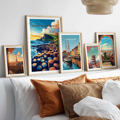 Giant's Causeway Travel Print displayed among other travel prints in a stylish living room setting.