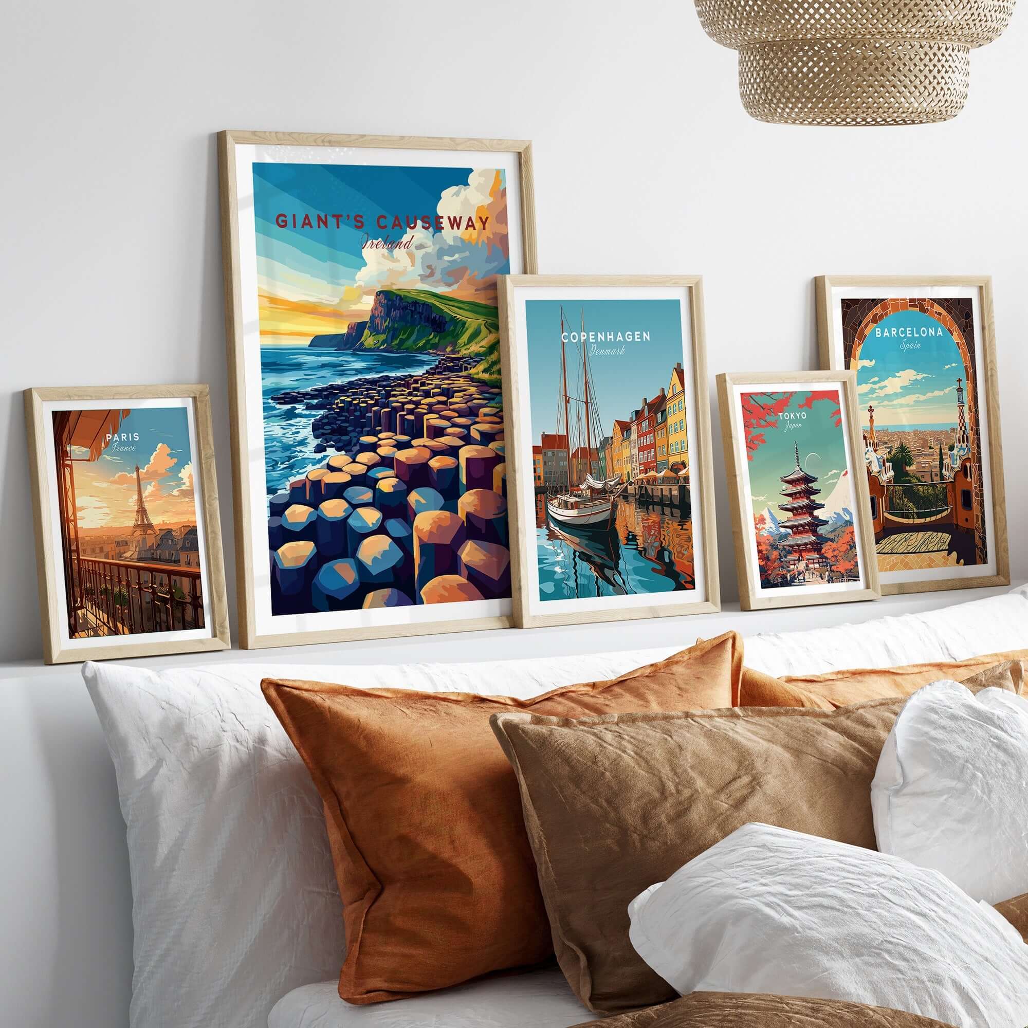 Giant's Causeway Travel Print displayed among other travel prints in a stylish living room setting.