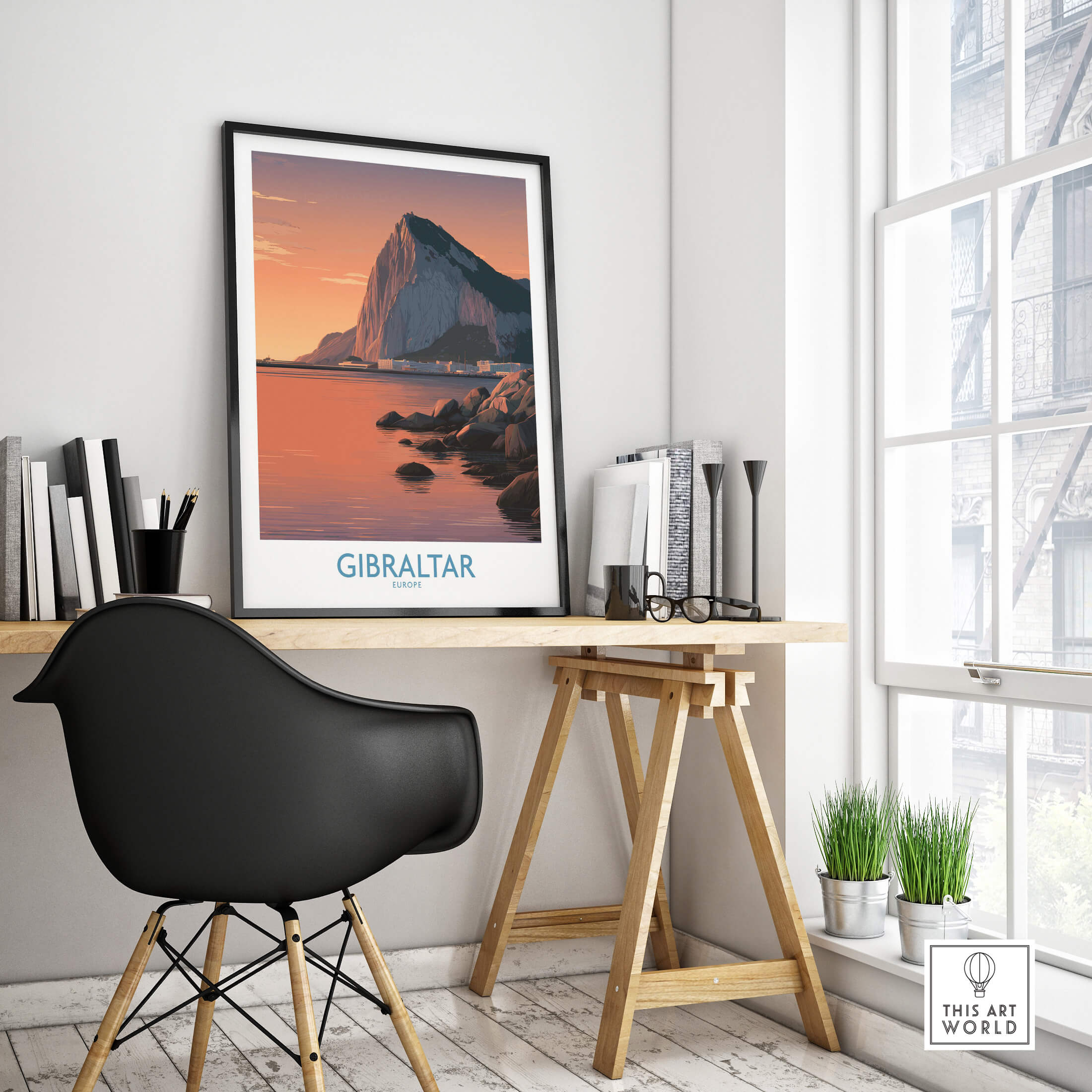 Gibraltar Wall Art –The Rock & Bay Landscape Print displayed in a modern interior with a black chair and natural lighting.