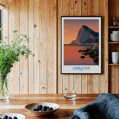 Gibraltar Wall Art –The Rock & Bay Landscape Print displayed in a wooden interior with floral decor.