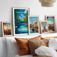 Ginnie Springs Kayaking Nature View Print | Blue Water Home Decor displayed among framed travel art on a cozy bed.