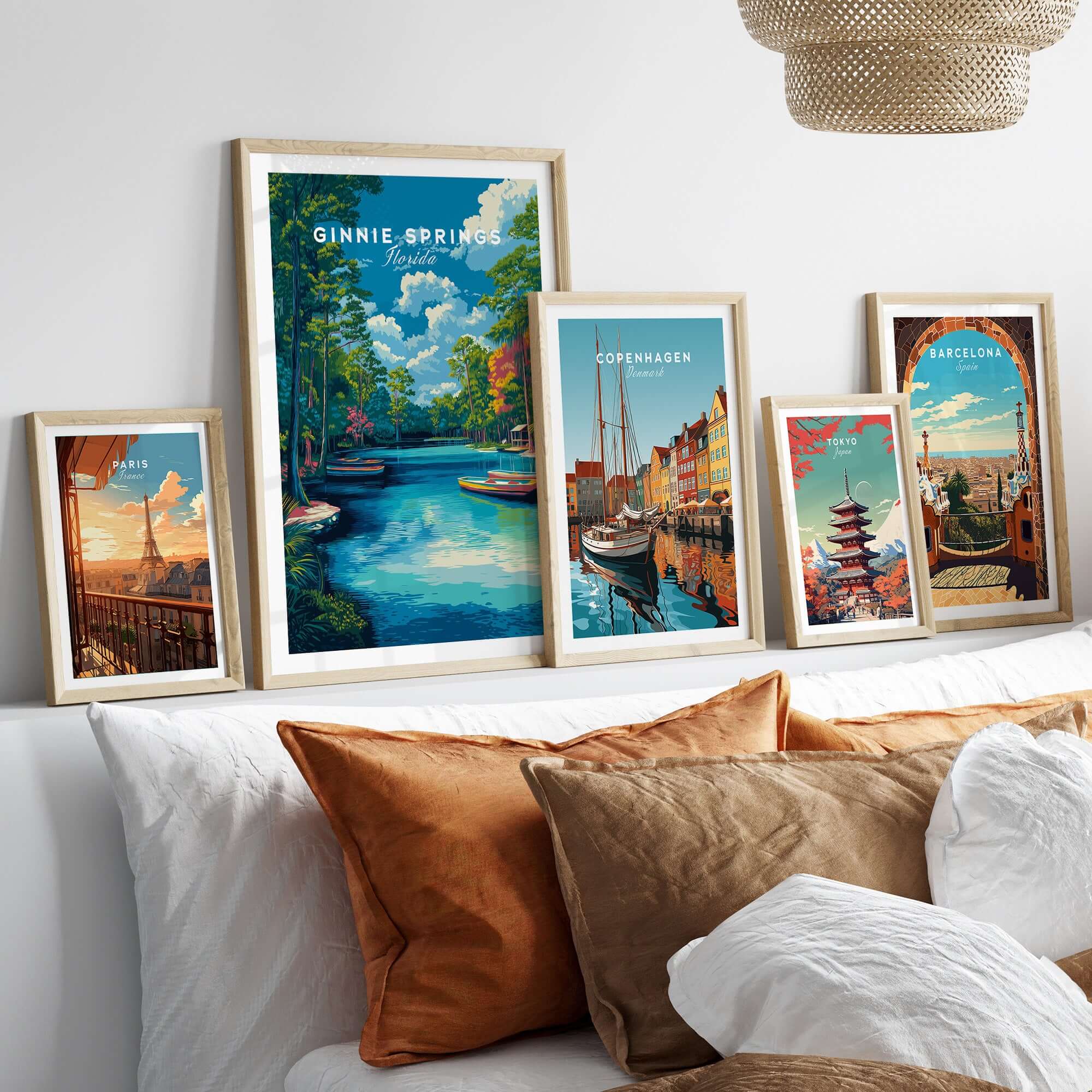 Ginnie Springs Kayaking Nature View Print | Blue Water Home Decor displayed among framed travel art on a cozy bed.