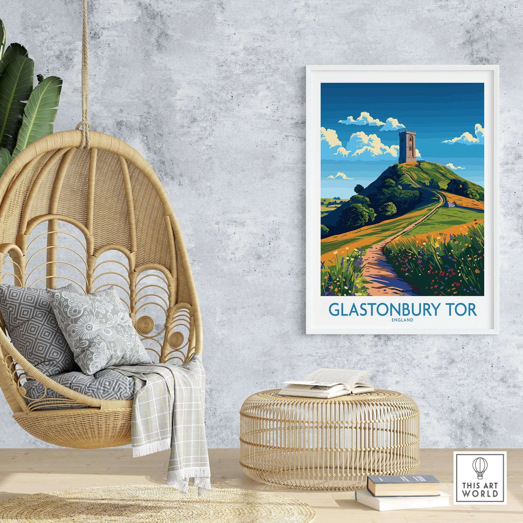 Glastonbury Tor Wall Art Print displayed in a stylish living room with hanging chair and decorative elements.
