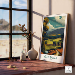 Glen Tanar Poster Scotland displayed indoors near a window, showcasing scenic views of Glen Tanar Valley.