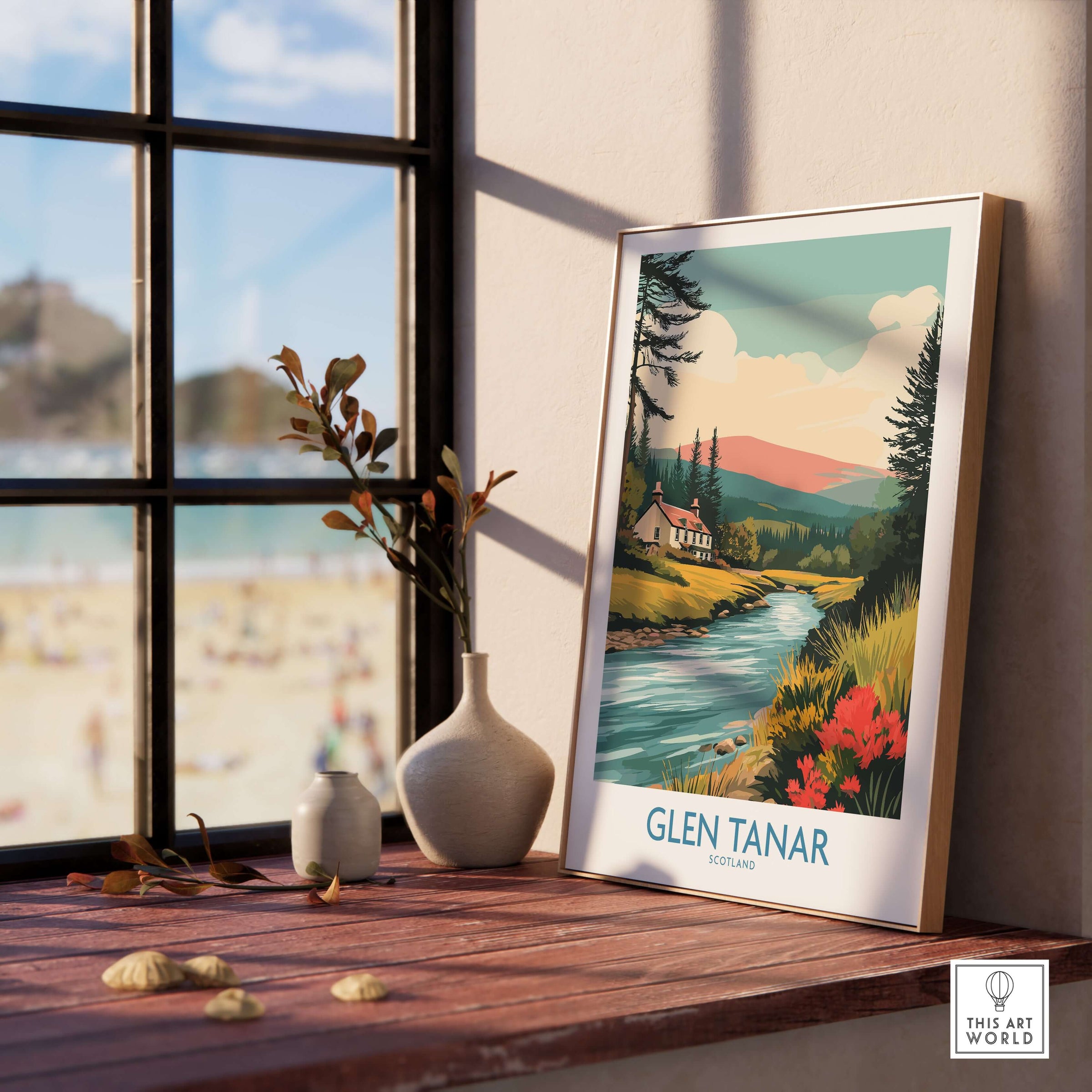 Glen Tanar Scotland Print showcasing serene river and landscape in a home setting with a beach view.