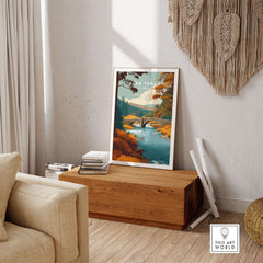 Glen Tanar Scotland Wall Art featuring a serene river and autumn foliage in a cozy living room setting.