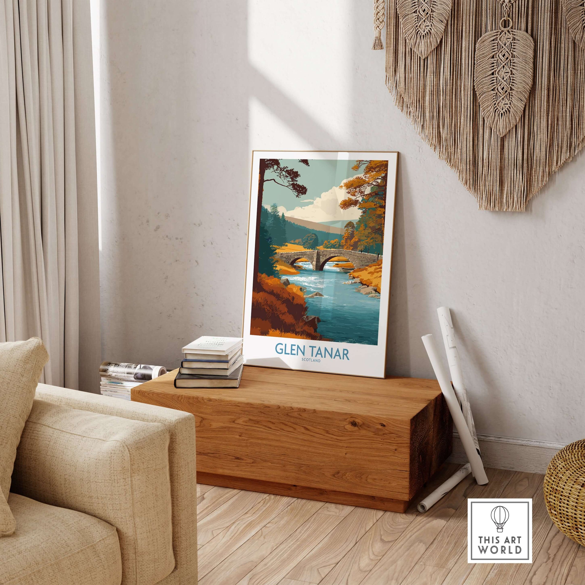Glen Tanar Scotland Wall Art Print displayed on a wooden bench in a cozy living room setting.