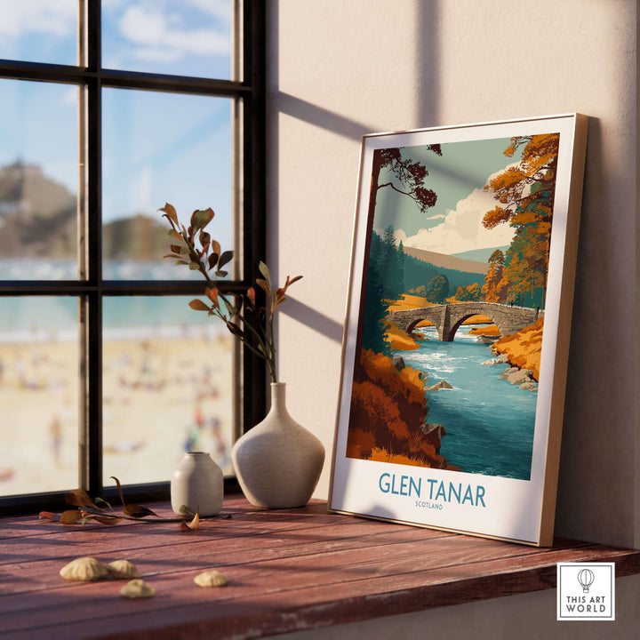 Glen Tanar Scotland wall art print displayed in a cozy room, featuring a beautiful landscape and a bridge.