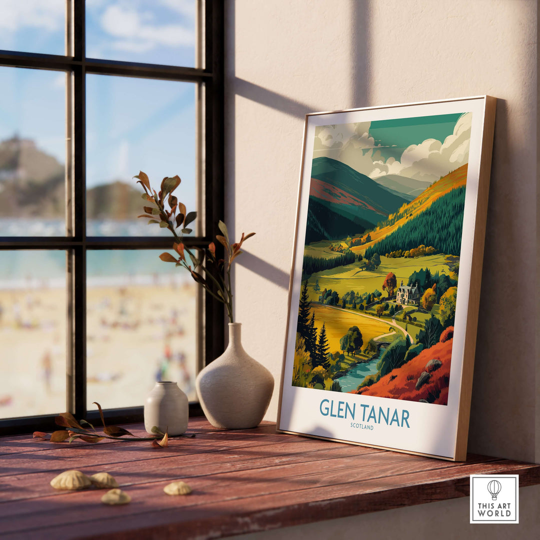 Glen Tanar travel poster showcasing scenic Scottish landscapes and charming villages on a windowsill.