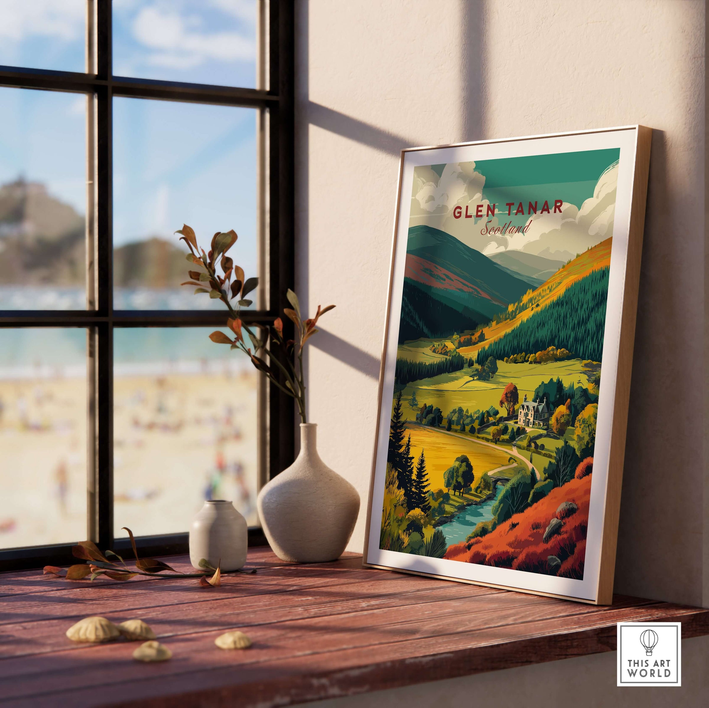 Glen Tanar Travel Print showcasing the stunning Scottish Highlands landscape in a stylish frame by a window.