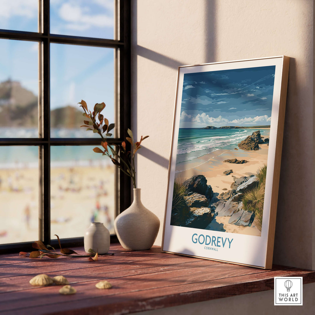 Godrevy Beach poster showcasing Cornwall's seascape art print, framed and displayed by a window with coastal decor.