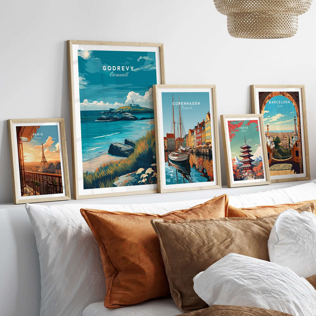 Godrevy poster among framed art prints, showcasing coastal decor with vibrant seascapes and cityscapes.