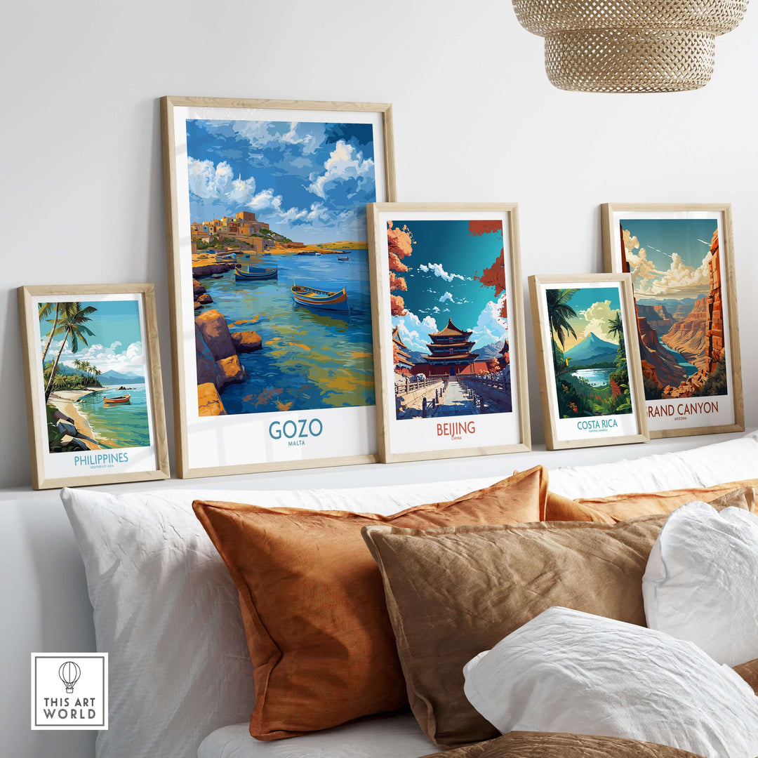 Gozo Malta Coastal Village Art Print | Traditional Boats Poster displayed among other travel art prints on a cozy couch