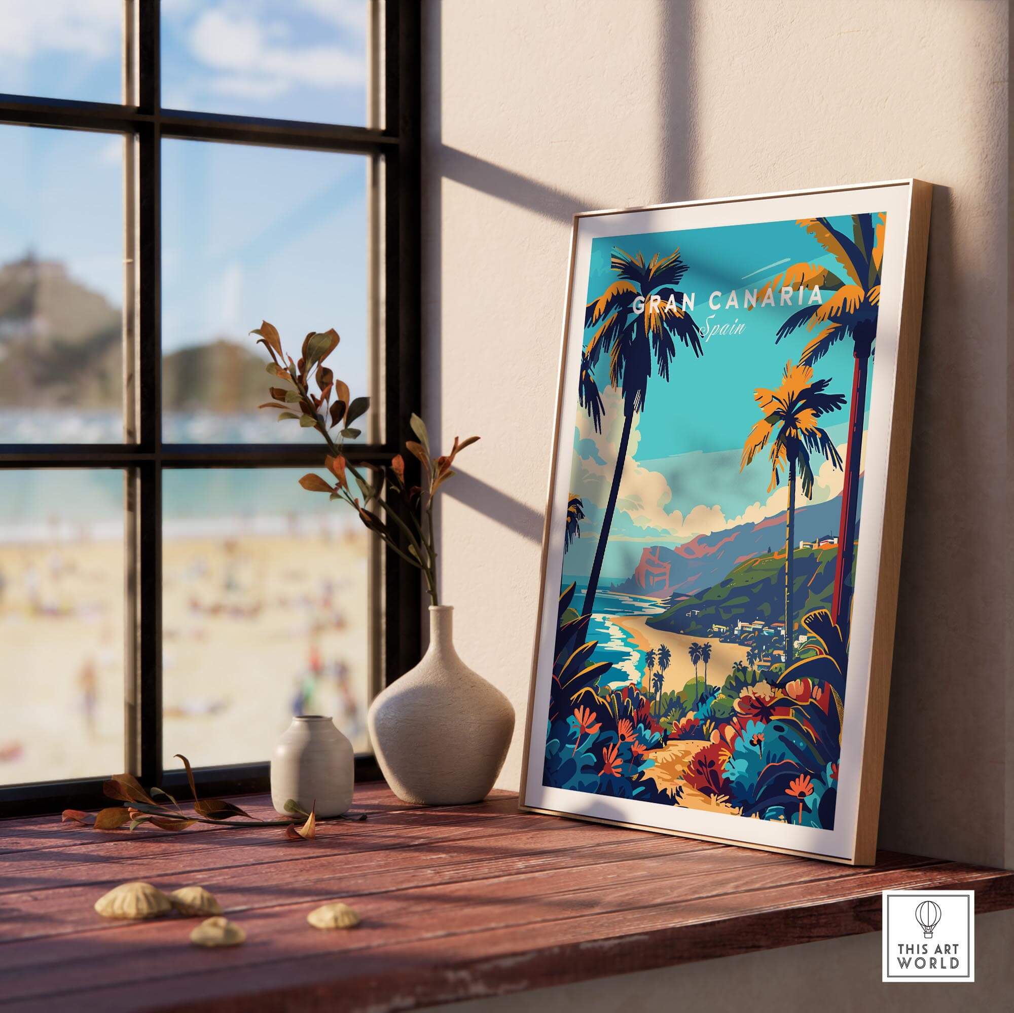 Gran Canaria Travel Print - Canary Islands displayed in a bright room with a beach view through the window.