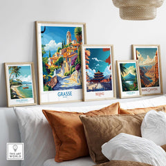 Grasse Travel Poster displayed among travel-themed art prints on a stylish shelf in a cozy living space.