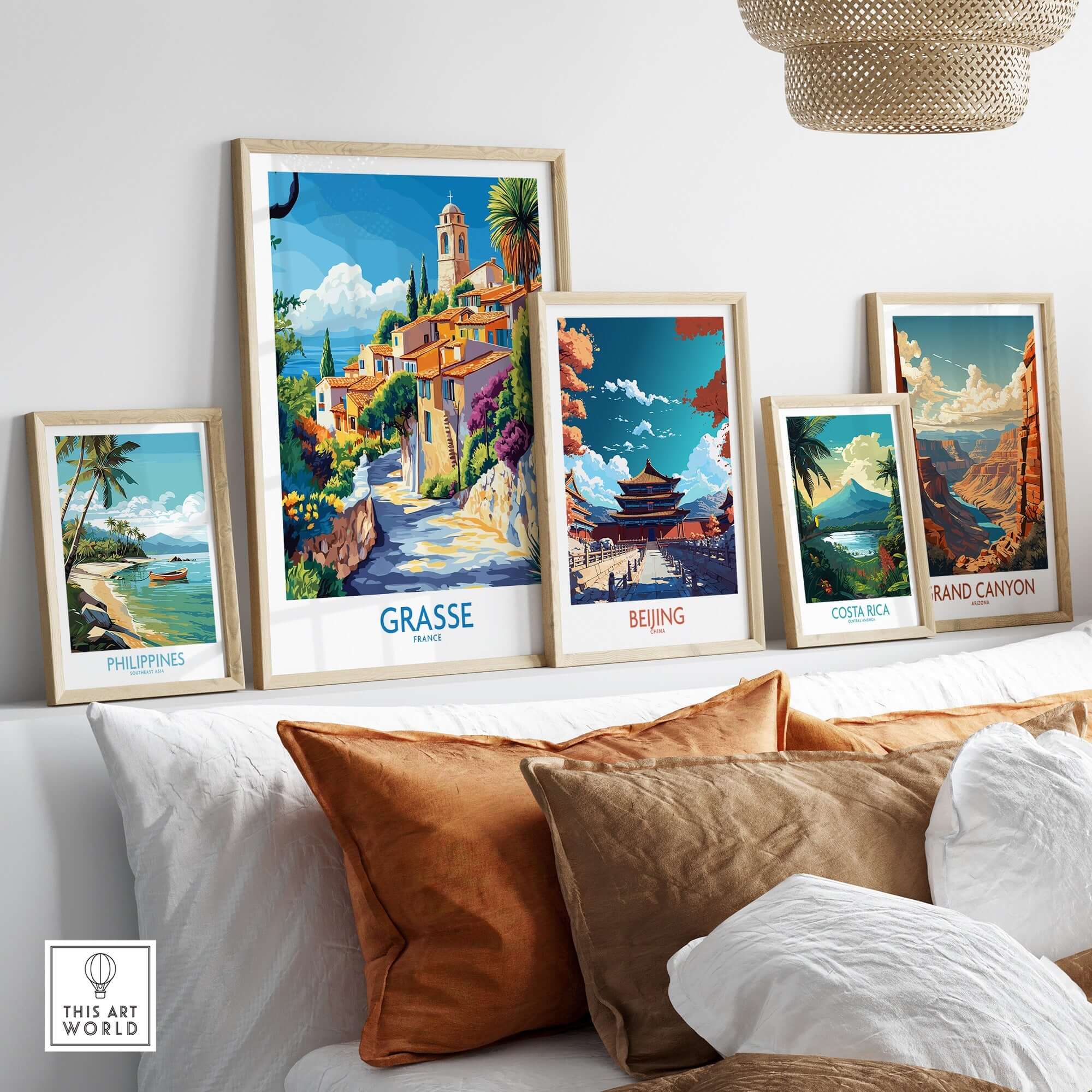 Grasse Travel Poster displayed among travel-themed art prints on a stylish shelf in a cozy living space.