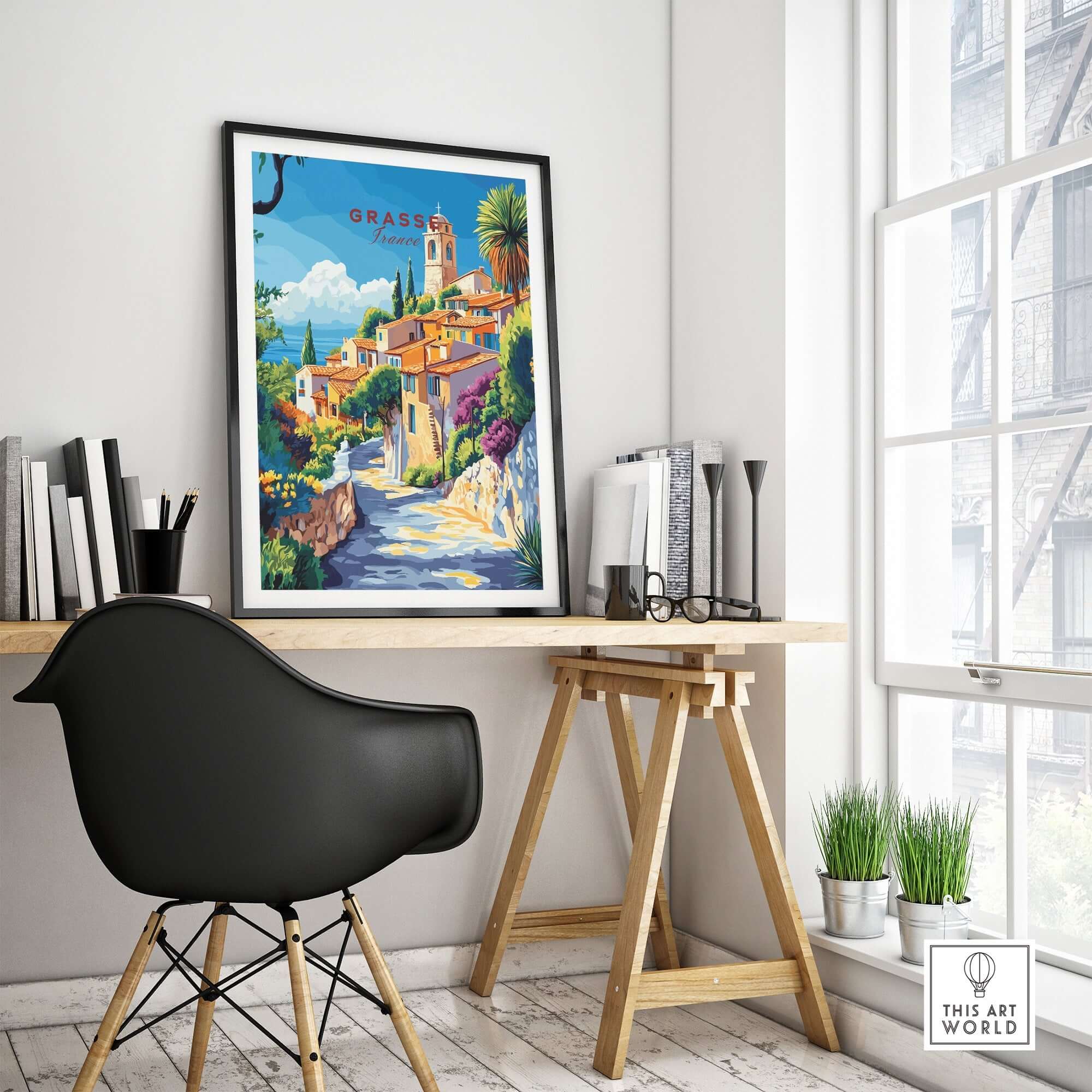 Grasse Travel Print displayed in a stylish home office setting, showcasing vibrant colors and intricate details.