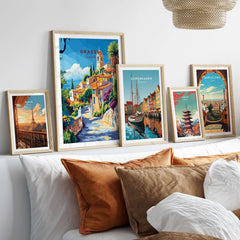 Grasse Travel Print displayed among other travel prints in a stylish home interior, showcasing vibrant colors and details.