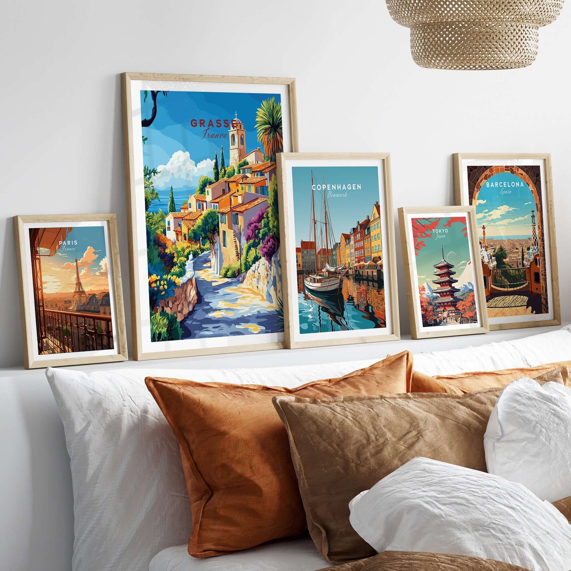 Grasse Travel Print displayed among other travel prints in a stylish home interior, showcasing vibrant colors and details.