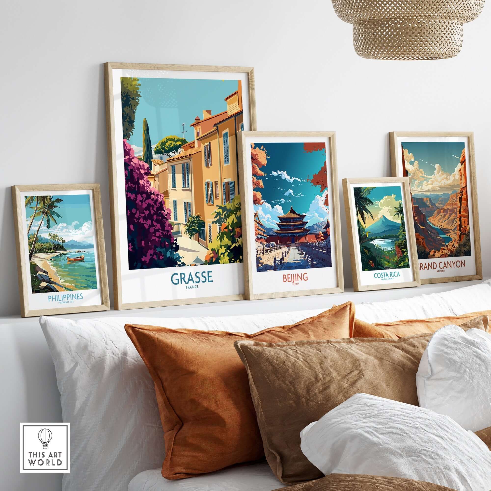 Grasse Wall Art Print France displayed among other travel-themed prints in a stylish living room setting.