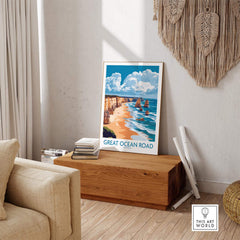 Great Ocean Road Travel Poster displayed in a stylish living room setting with coastal scenery.
