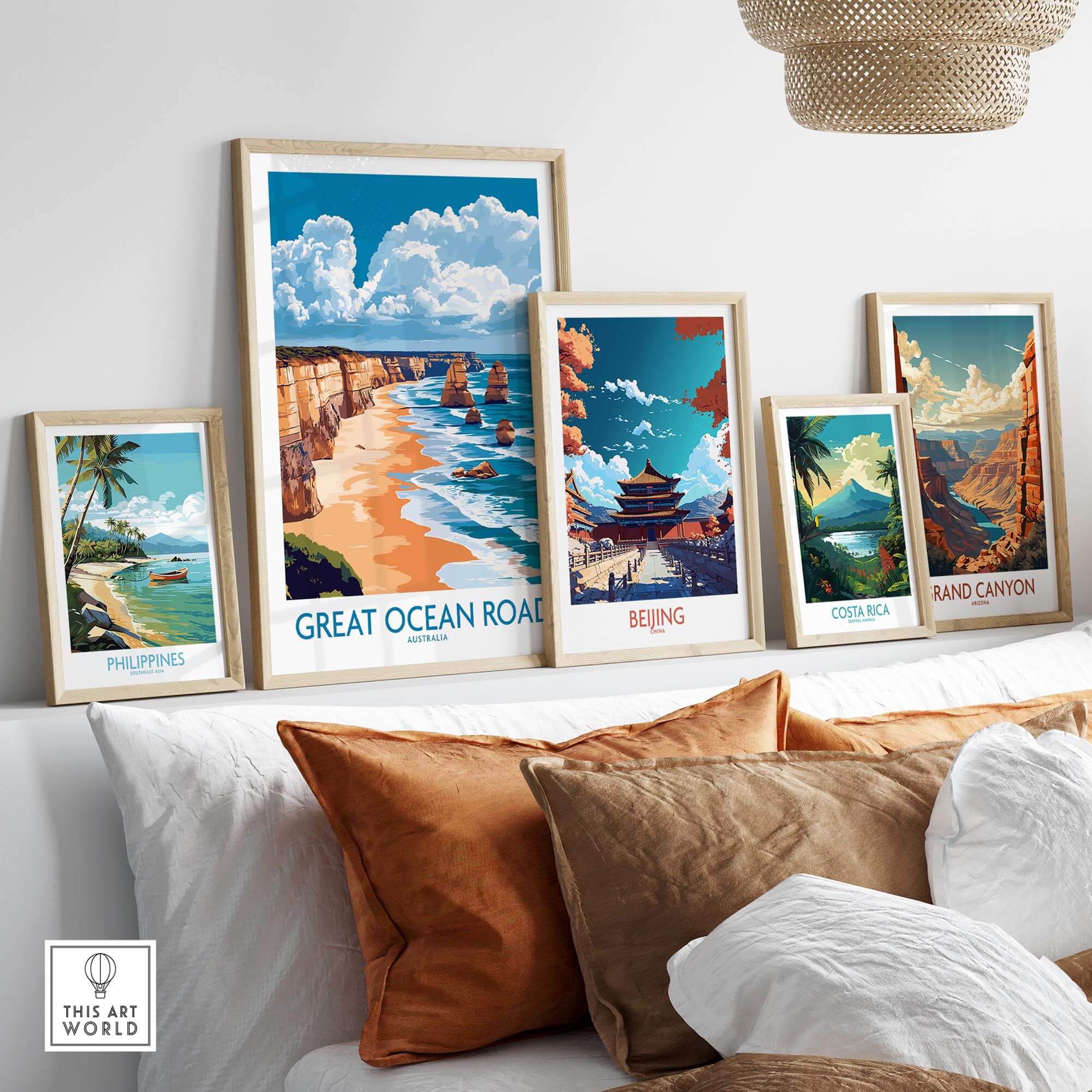 Great Ocean Road Travel Poster displayed among other travel art on a cozy couch setting, inspiring wanderlust.