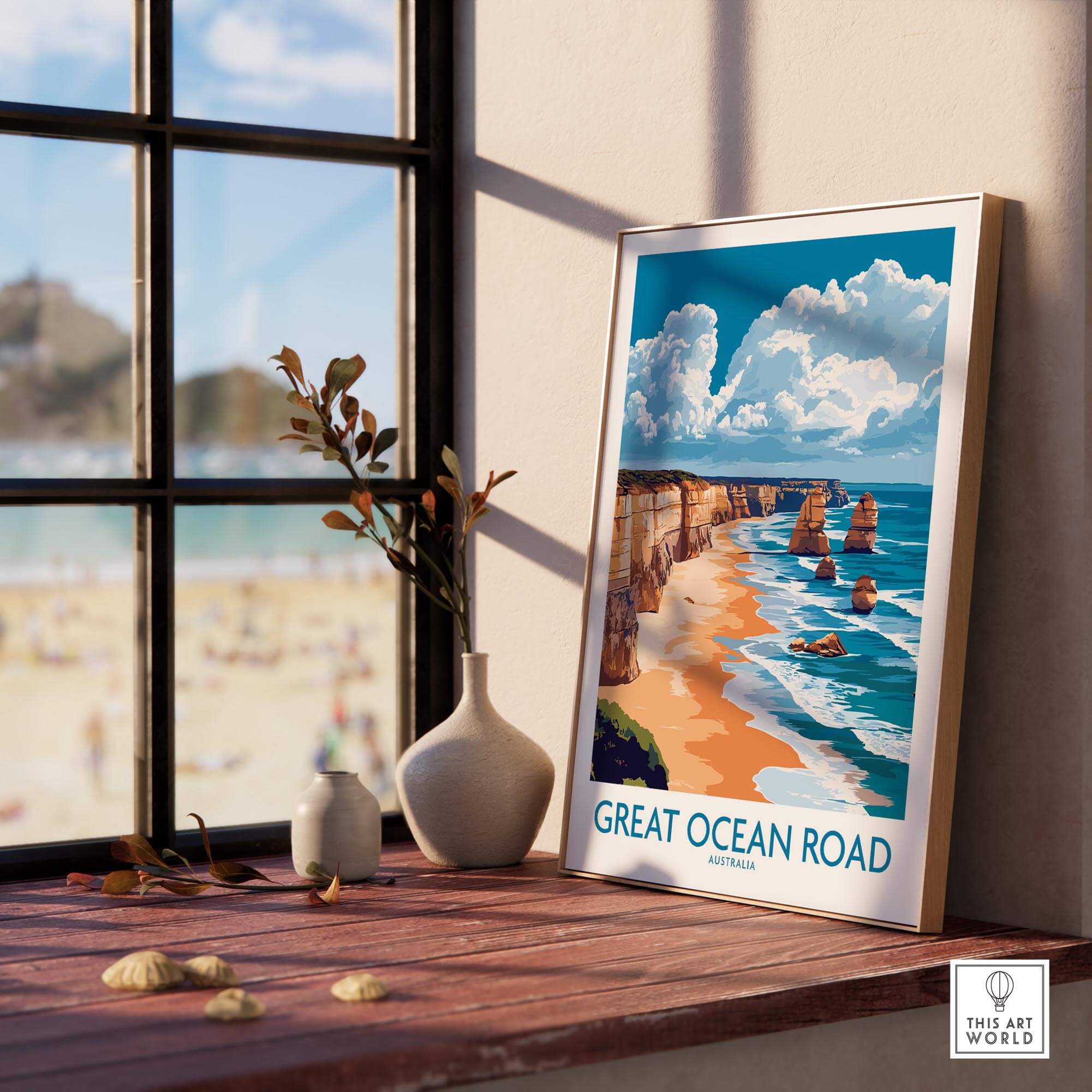 Great Ocean Road Travel Poster displayed by a sunny window, showcasing Australia's stunning coastal scenery.