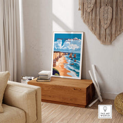 Great Ocean Road Travel Print displayed in a stylish living room, showcasing the stunning coastal scenery of Australia.