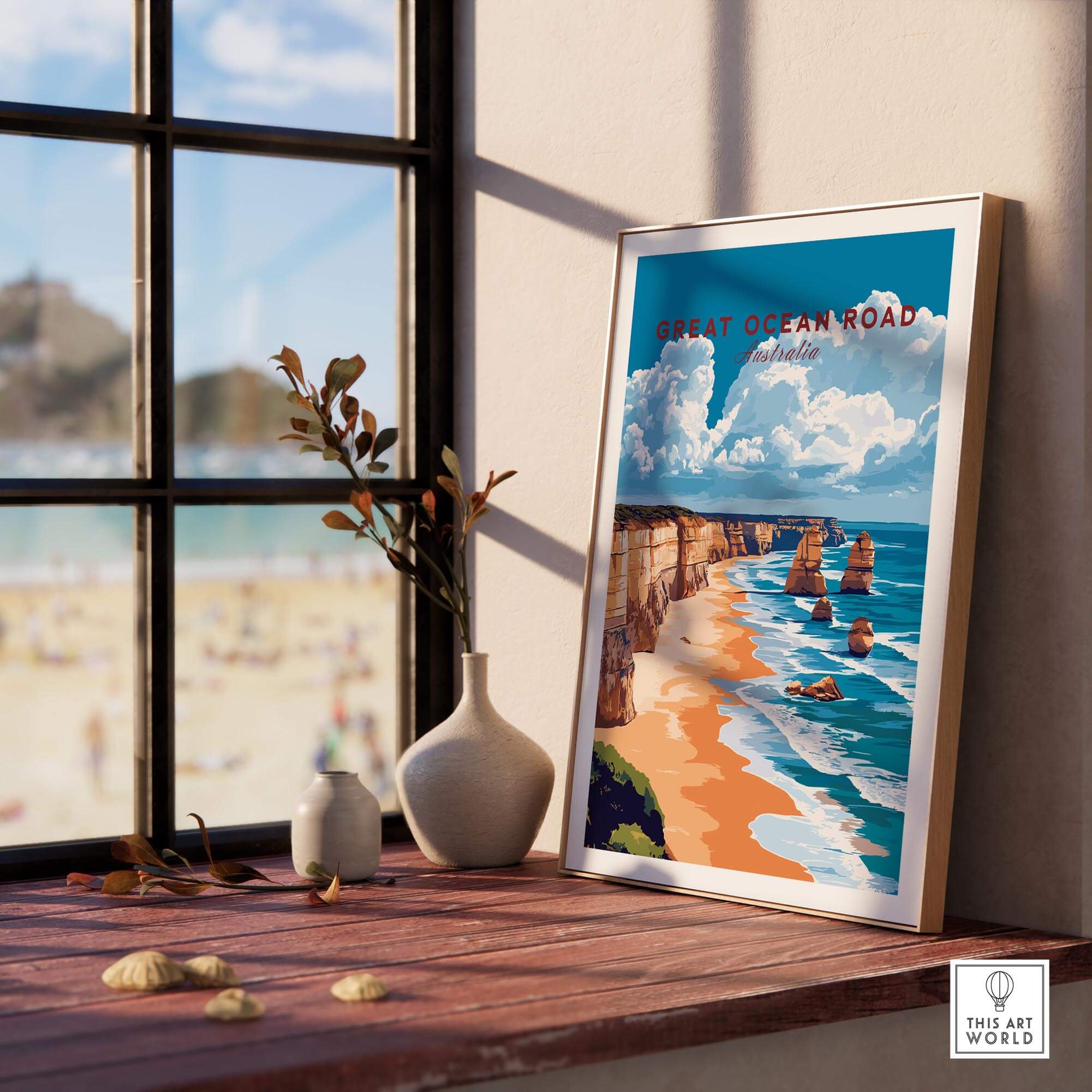 Great Ocean Road Travel Print showcasing the iconic 12 Apostles with a beach view from a sunny window.
