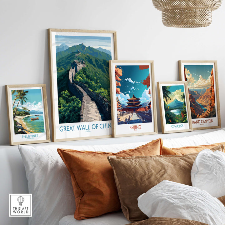 Great Wall of China Mountain Vista poster among various travel-themed art framed on a stylish shelf.
