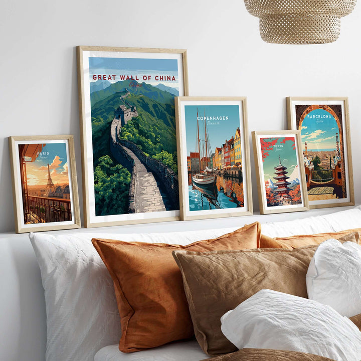 Great Wall of China scenic view poster among framed wall art on a stylish sofa display.