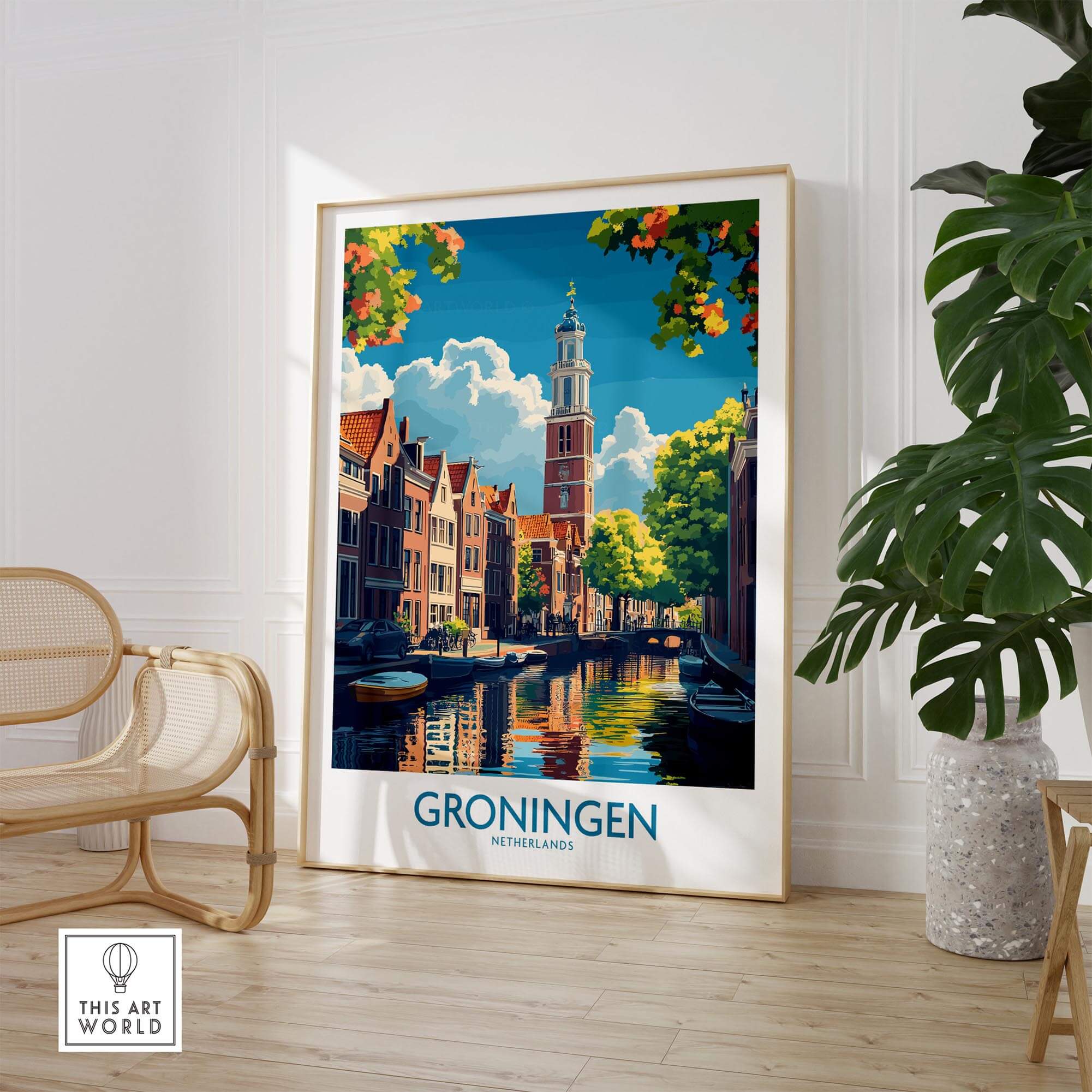 Groningen Poster Netherlands featuring a picturesque canal scene and colorful buildings in a stylish home setting.