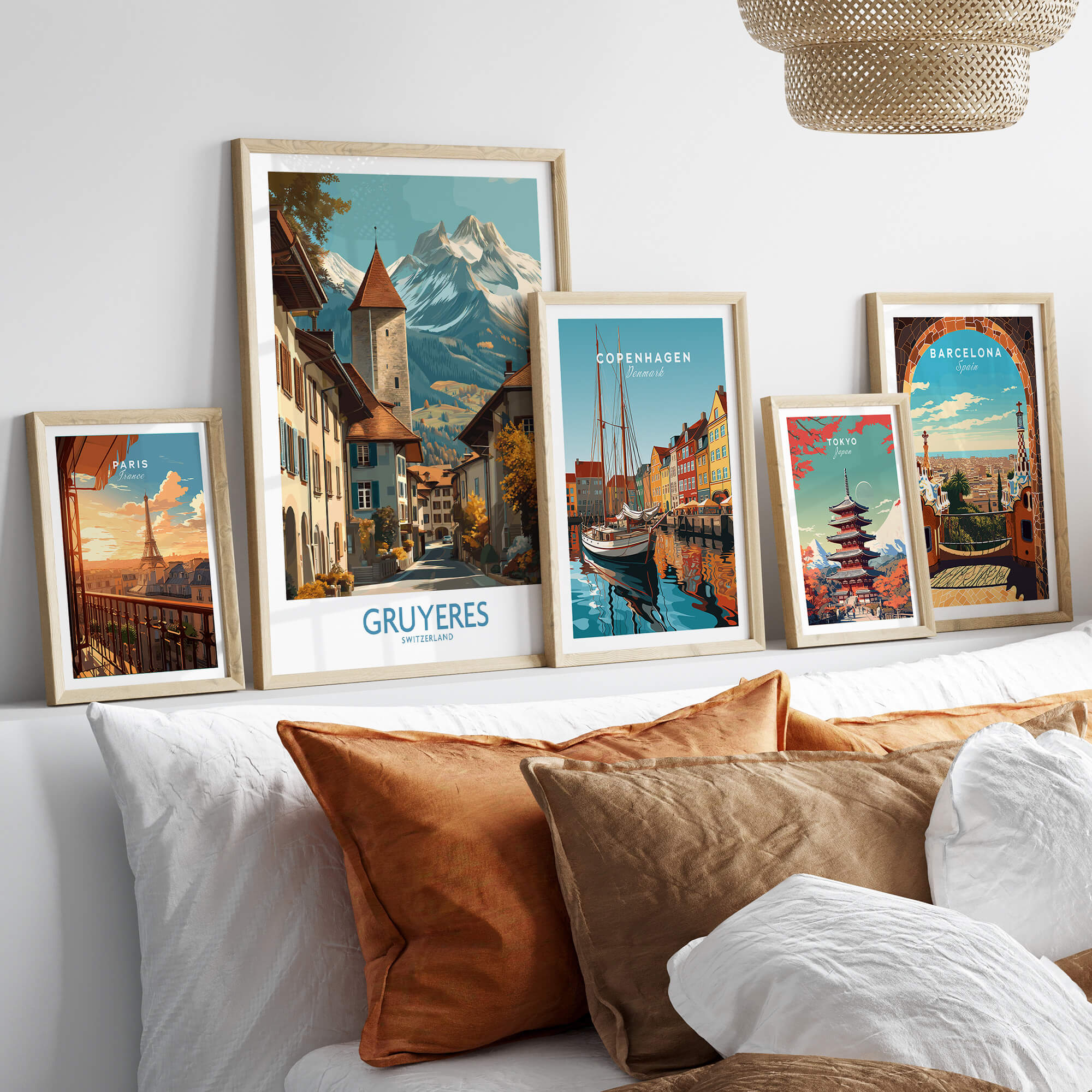 Gruyères Switzerland Poster | Scenic Alpine Village Canvas Print displayed among framed artworks on a stylish couch.