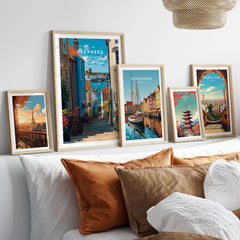 Guernsey Channel Islands Harbour Print | British Seaside Decor displayed with framed city prints on a cozy sofa.
