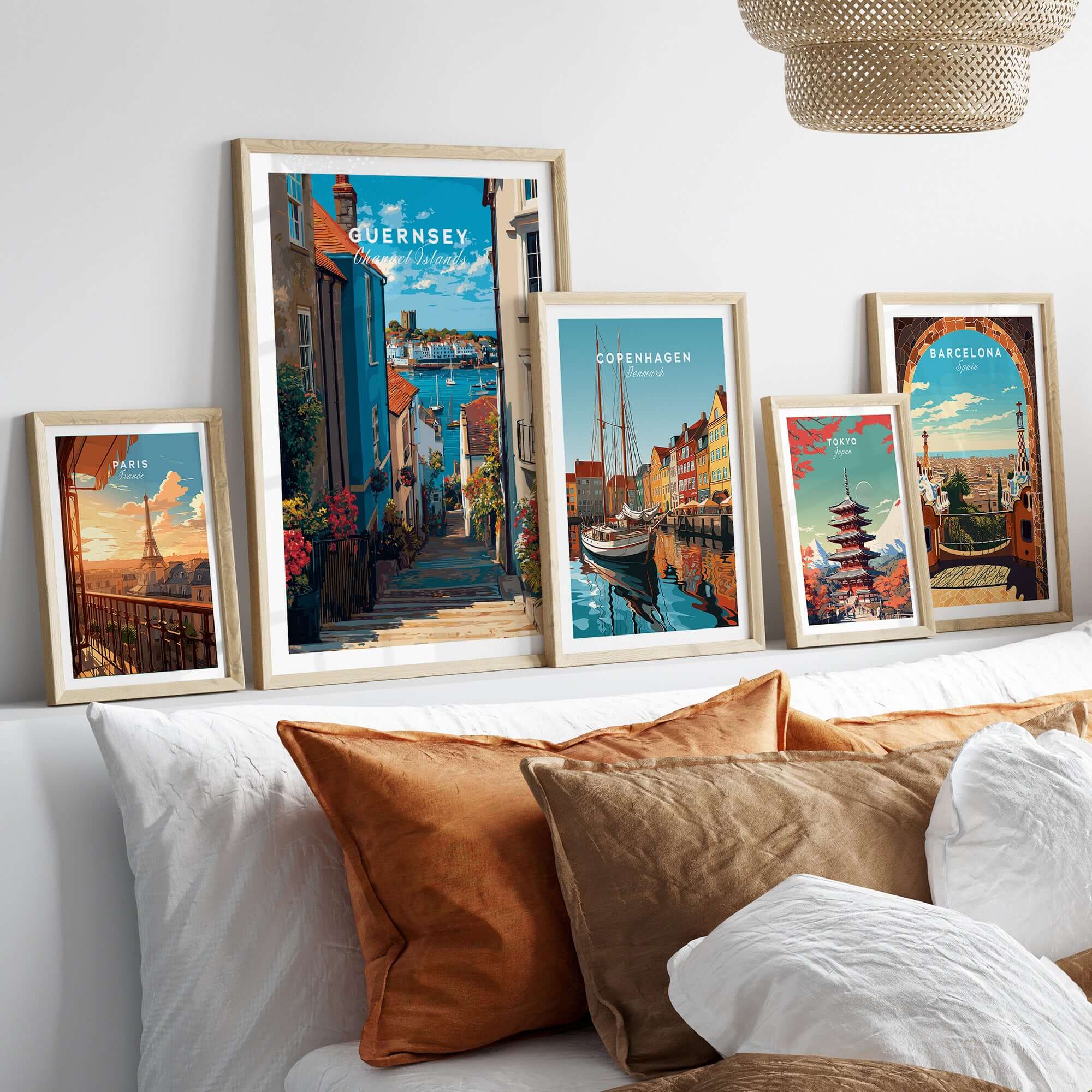 Guernsey Channel Islands Harbour Print | British Seaside Decor displayed with framed city prints on a cozy sofa.