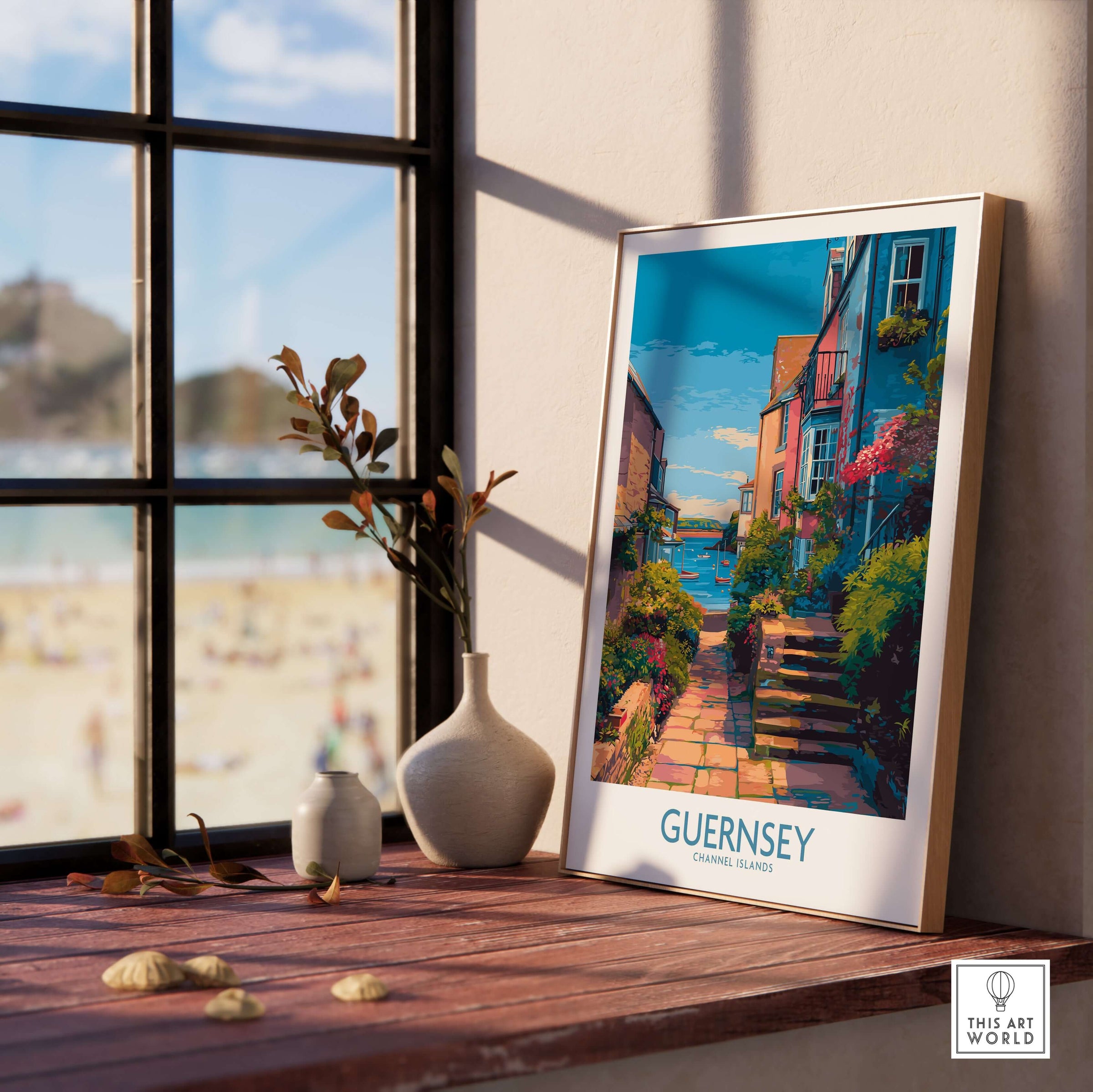 Guernsey Poster - Channel Islands Art Print | Harbour View displayed on a wooden table near a beachside window.