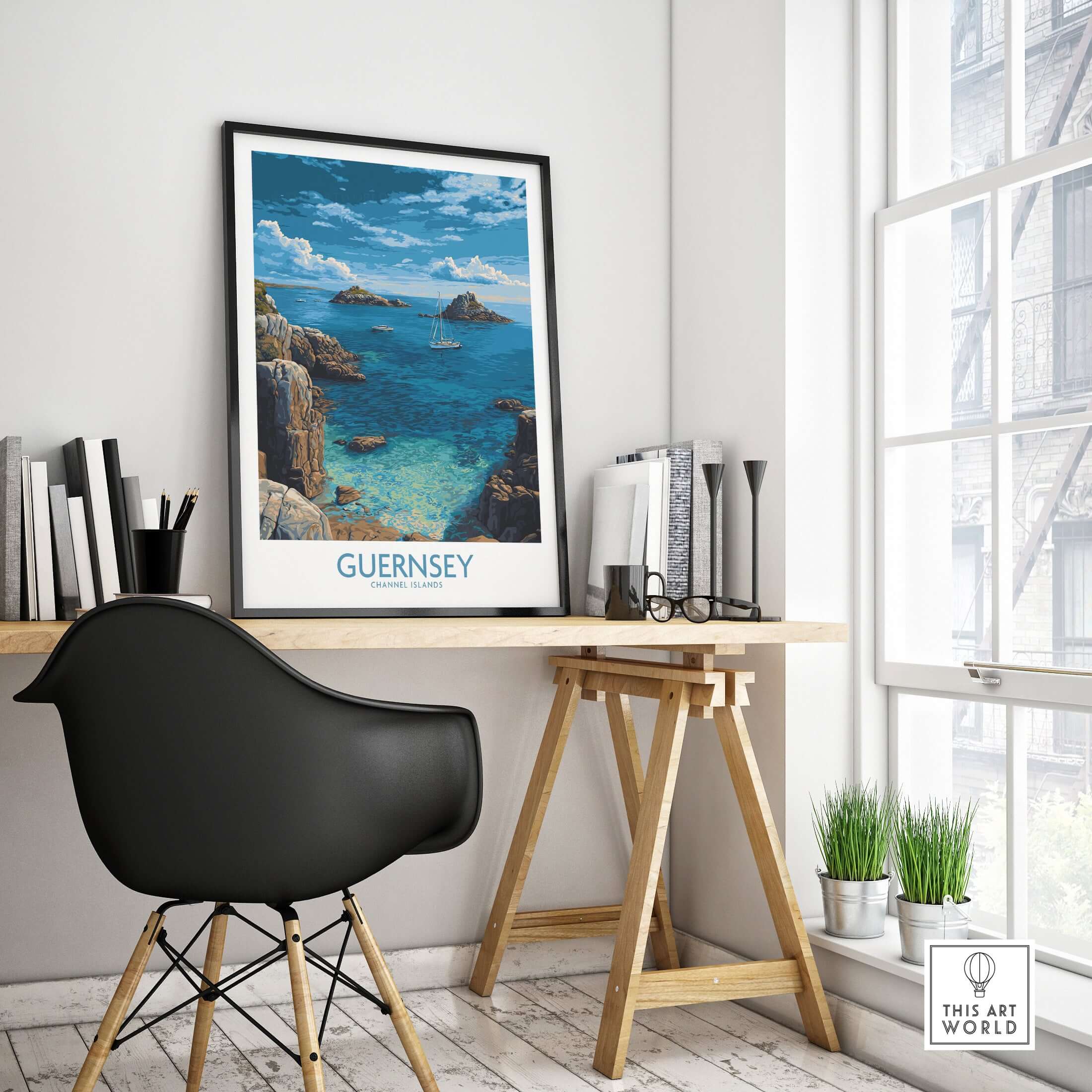 Guernsey Print Channel Islands Coast Art | Rocky Shore Sailing Poster displayed in a modern home office with a stylish chair.