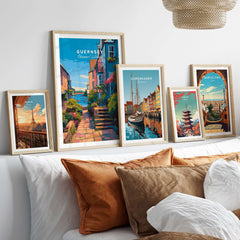 Guernsey St Peter Port Steps Print | British Seaside Wall Decor collection displayed on a couch.