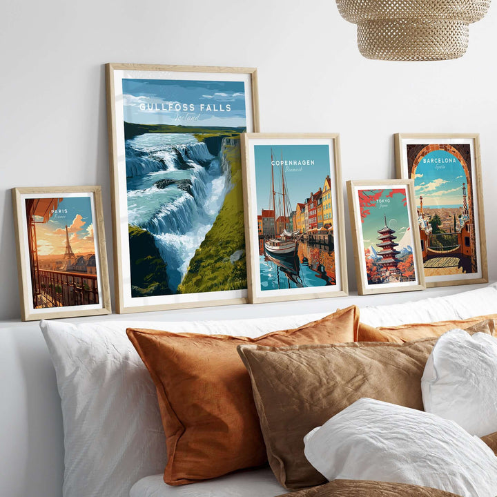 Gullfoss Falls Iceland Print | Icelandic Landscape Decor displayed among other travel prints on a stylish couch.