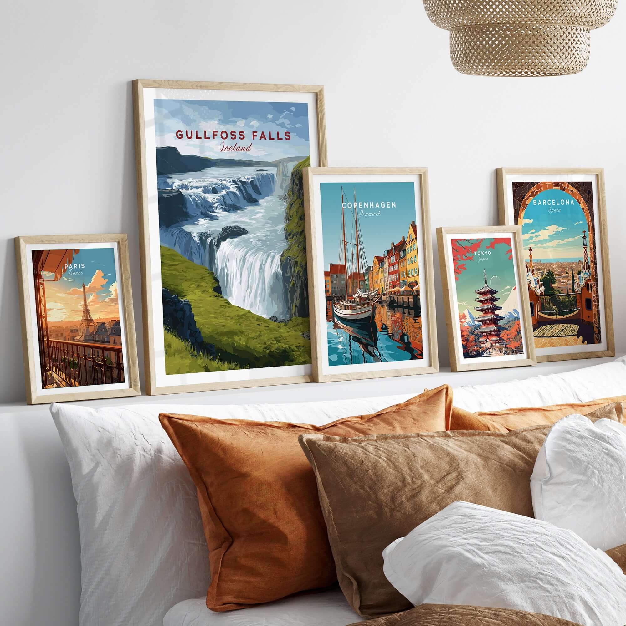 Gullfoss Falls Poster Iceland | Nordic Nature Wall Decor displayed with other travel posters on a modern couch.