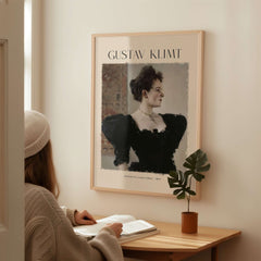 Gustav Klimt Art Print - Portrait of a Lady in Black 1894 displayed in a cozy interior setting.
