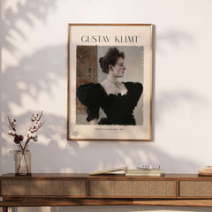 Gustav Klimt Art Print - Portrait of a Lady in Black 1894 displayed on a stylish wall with a wooden console.