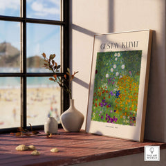Gustav Klimt Art Print - Flower Garden Poster 1907 displayed on a windowsill with beach view.