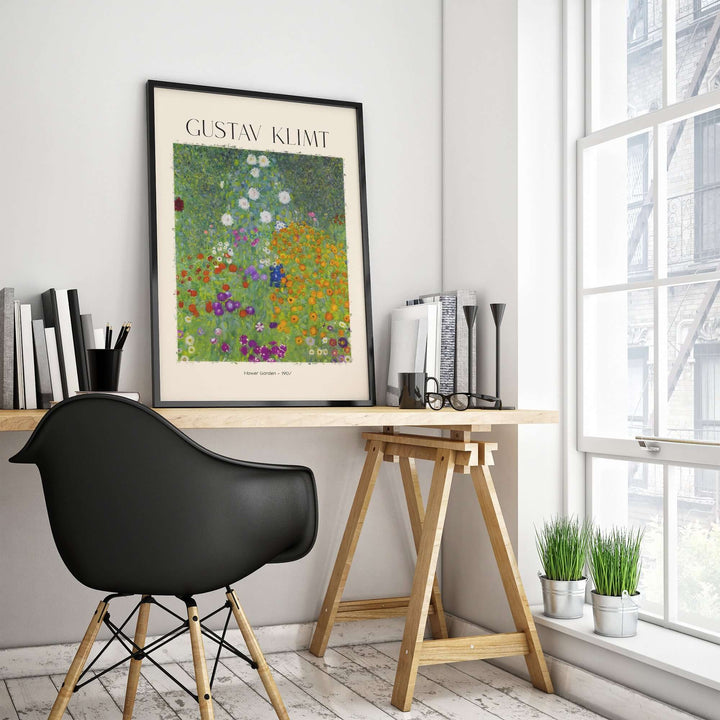 Gustav Klimt Flower Garden poster displayed in a modern workspace with black chair and wood desk.