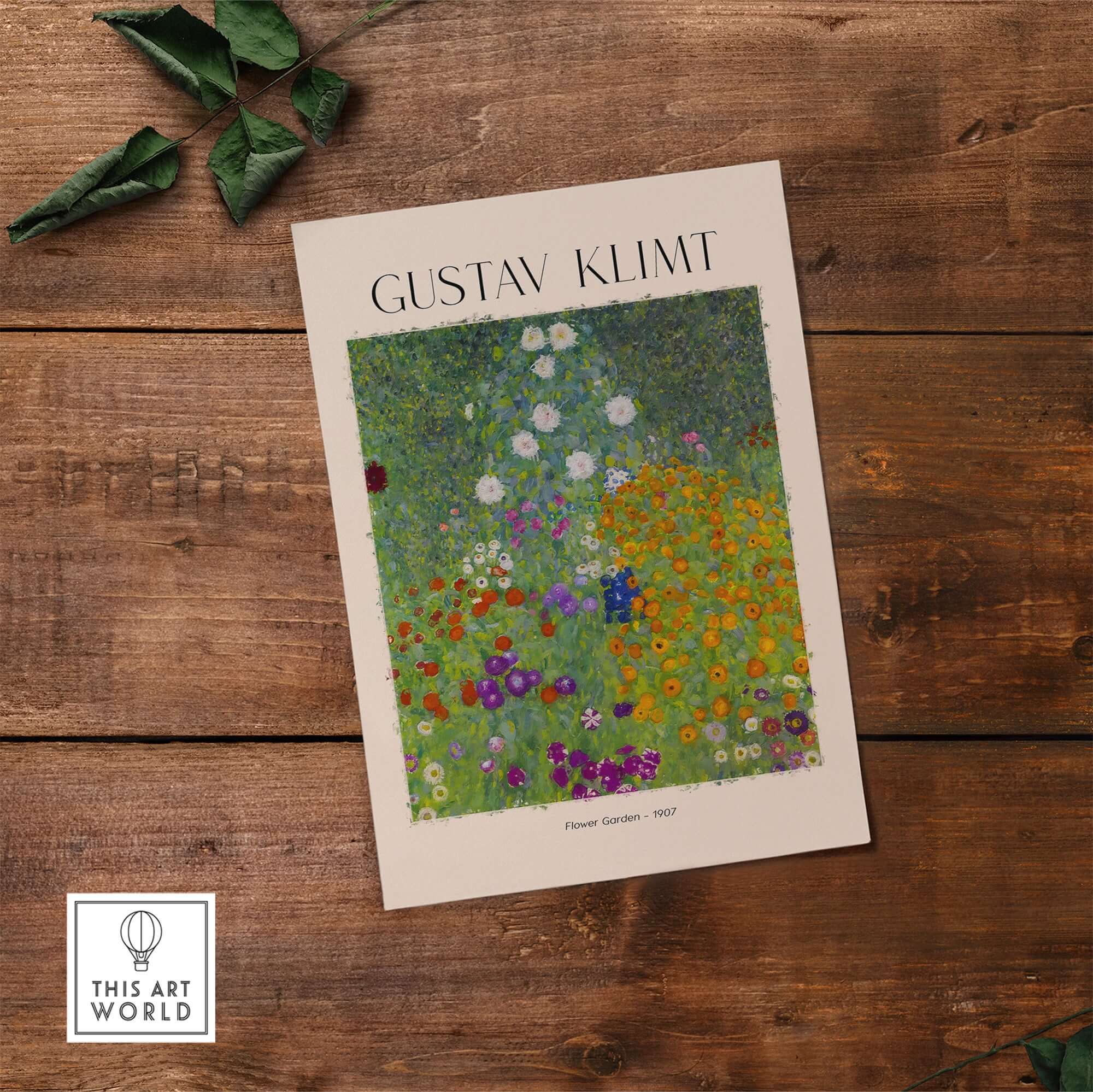 Gustav Klimt Art Print - Flower Garden Poster 1907 displayed on a wooden surface with green leaves.